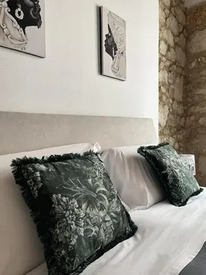 Letto o letti in una camera di Rua 39 fine apartments by Dimore in Sicily