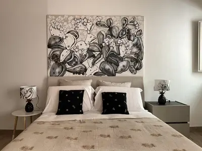 Letto o letti in una camera di Rua 39 fine apartments by Dimore in Sicily