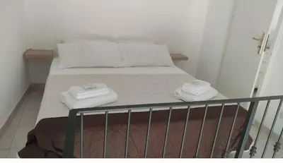 Letto o letti in una camera di Cutelli Appartament