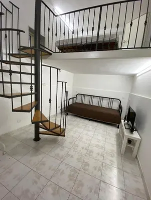 Letto o letti in una camera di Cutelli Appartament