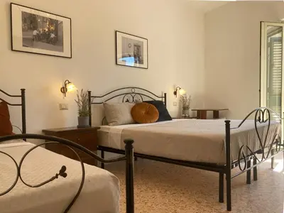 Letto o letti in una camera di Casa Alva