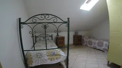 Letto o letti in una camera di Villa Mora on two levels 50 meters from the sea - wi-fi
