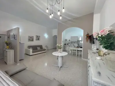 Area soggiorno di Lina's Home near the sandy beach & with wifi
