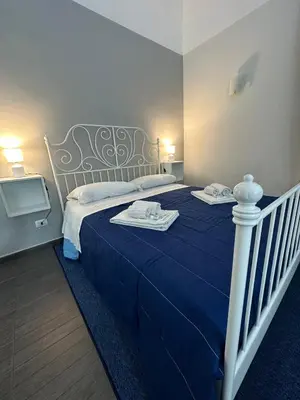 Letto o letti in una camera di Etna Rooms
