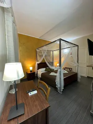 Letto o letti in una camera di Etna Rooms