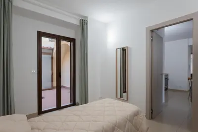 Letto o letti in una camera di GuestHost - Catania Historic Center Modern Apt