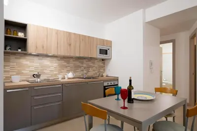 Cucina o angolo cottura di GuestHost - Catania Historic Center Modern Apt