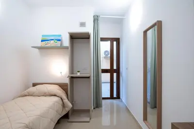Letto o letti in una camera di GuestHost - Catania Historic Center Modern Apt