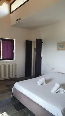 Letto o letti in una camera di Villa Calma