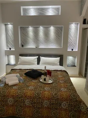 Letto o letti in una camera di Il cortiletto28 Rooms & House