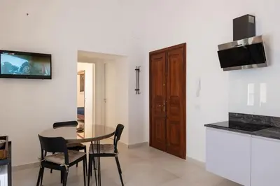 Cucina o angolo cottura di Collegiata Apartment - Catania Downtown