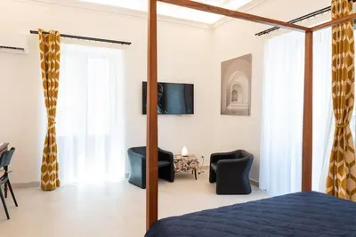 TV o dispositivi per l'intrattenimento presso Collegiata Apartment - Catania Downtown