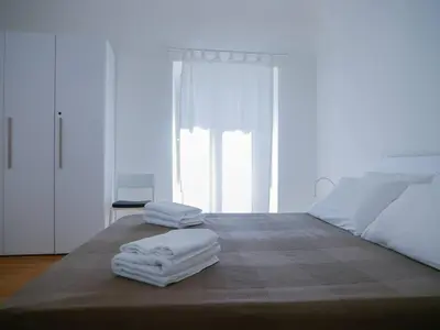 Letto o letti in una camera di Ai banchi Apartment