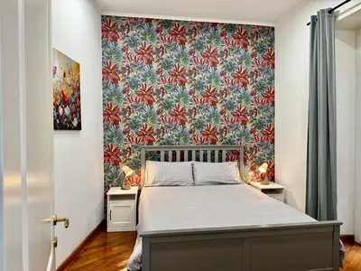 Letto o letti in una camera di Gli Appartamenti al Duomo