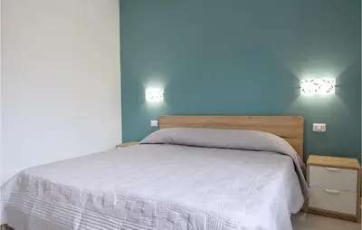 Letto o letti in una camera di 1 Bedroom Cozy Apartment In Siracusa