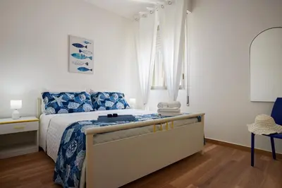 Letto o letti in una camera di Villa Dema, sea front & beach 20 mt