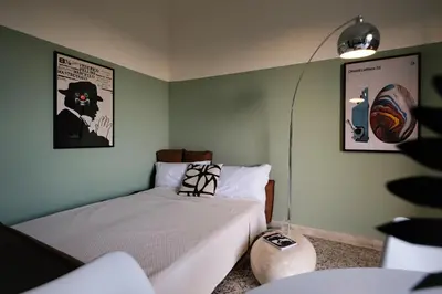 Letto o letti in una camera di Casa Tarocco by Sicily in Home