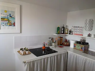 Cucina o angolo cottura di Macallè Suite Noto, charme e relax con vista mare