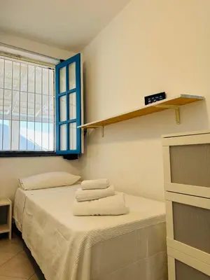 Letto o letti in una camera di Casa Patrizia a 10 metri dalla spiaggia