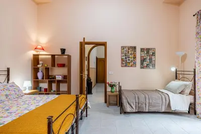 Letto o letti in una camera di GuestHost - Catania Central and Comfy Apartment