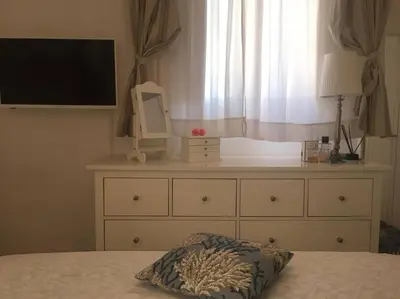 Letto o letti in una camera di Casa Sorriso