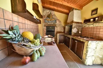 Cucina o angolo cottura di ISULATRAVEL - Villa Le Dune