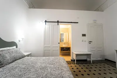 Letto o letti in una camera di Gli specchi di Archimede