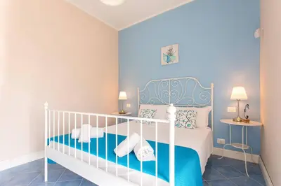 Letto o letti in una camera di Villa Indaco by Villa Plus