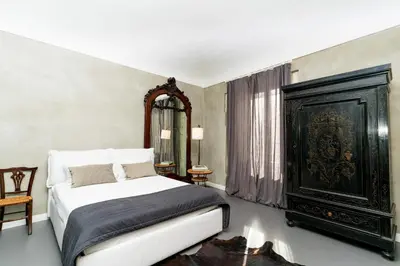 Letto o letti in una camera di San Giuseppe Luxury Apartment