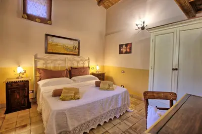 Letto o letti in una camera di Villa Maddalena by PosarelliVillas