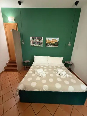 Letto o letti in una camera di Bnb San Barnaba
