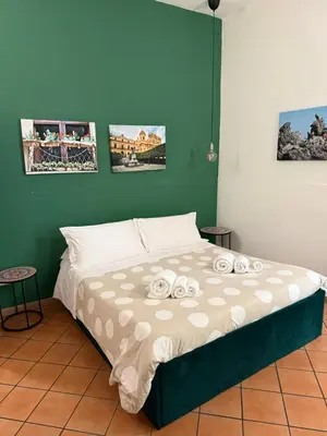 Letto o letti in una camera di Bnb San Barnaba