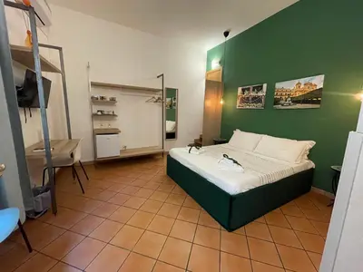 Letto o letti in una camera di Bnb San Barnaba