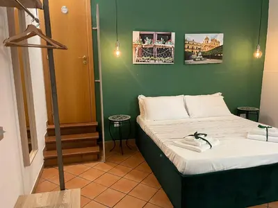Letto o letti in una camera di Bnb San Barnaba