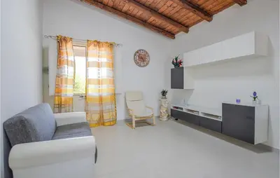 Area soggiorno di 2 Bedroom Cozy Home In Siracusa