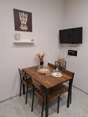 TV o dispositivi per l'intrattenimento presso Casa vacanze al teatro