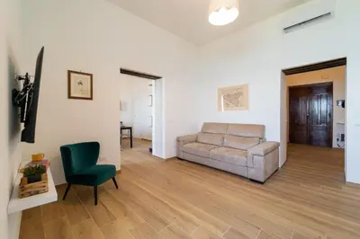 Area soggiorno di GuestHost - Ortigia Superior Sea View Apartment near Duomo