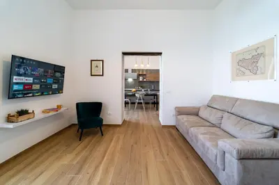 Area soggiorno di GuestHost - Ortigia Superior Sea View Apartment near Duomo