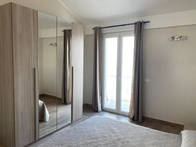 Letto o letti in una camera di Paola Confort House