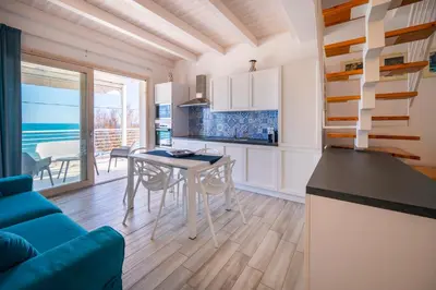 TV o dispositivi per l'intrattenimento presso Luci Apartment Sea Beach