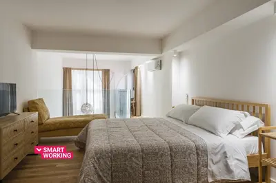 Letto o letti in una camera di Duplex Apartments del Vecchio Bastione by Wonderful Italy