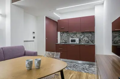 Cucina o angolo cottura di Duplex Apartments del Vecchio Bastione by Wonderful Italy