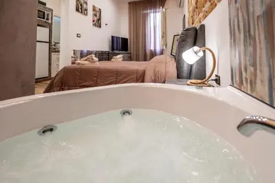 Letto o letti in una camera di Casa Vacanze RetroScena
