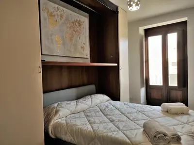 Letto o letti in una camera di Flora's House - Ortigia Holidays