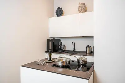 Cucina o angolo cottura di Loggiato Verga Luxury by Bed&Bros
