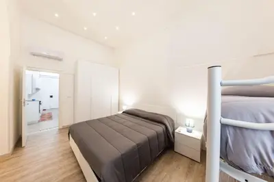 Letto o letti in una camera di Ragusia