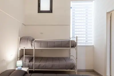 Letto o letti in una camera di Ragusia