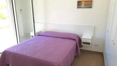 Letto o letti in una camera di Villa Azzurra - Fontane Bianche