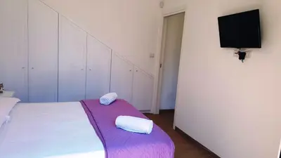 Letto o letti in una camera di Villa Azzurra - Fontane Bianche