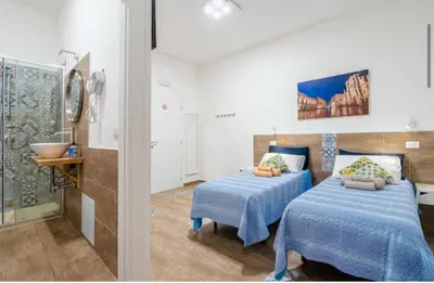 Letto o letti in una camera di RAUDINO ROOMS